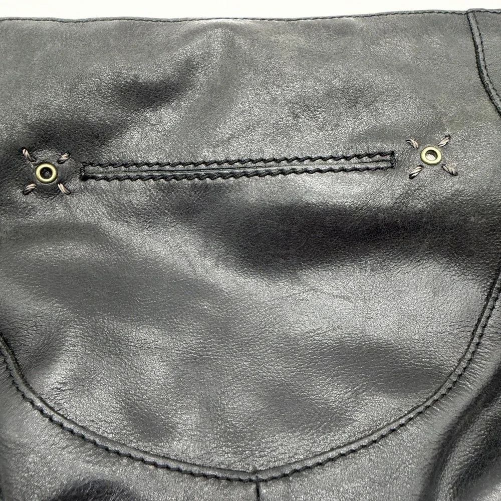 The Sak Indio Demi Leather Hobo Bag Braided Strap Whipstitch Charm Logo Black